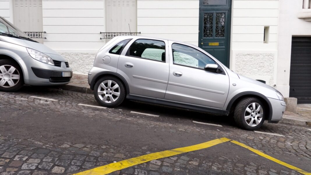 car parked on a slope with parking brake engaged