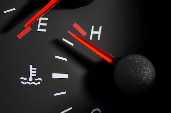 car engine temperature sensor close up arrows