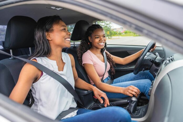 teen daughter and mom driving