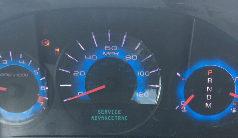 Ford Fusion dashboard with Service AdvanceTrac warning light