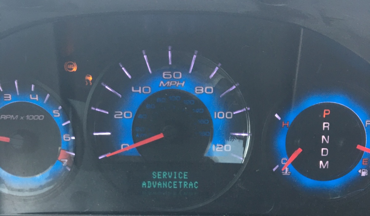 Ford Fusion dashboard with Service AdvanceTrac warning light