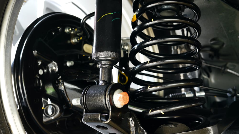 Suspension spring and undercar inspection during vehicle service