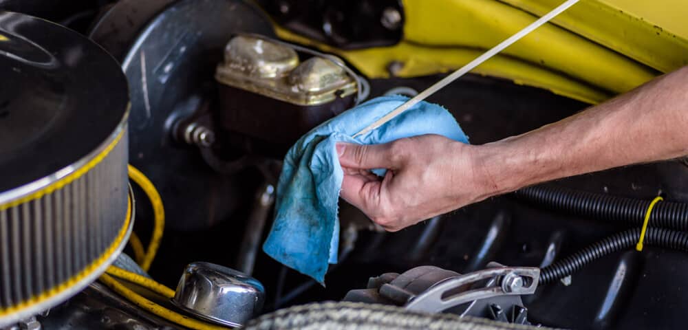 Checking transmission fluid level during a full vehicle service