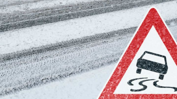 car driving on icy road