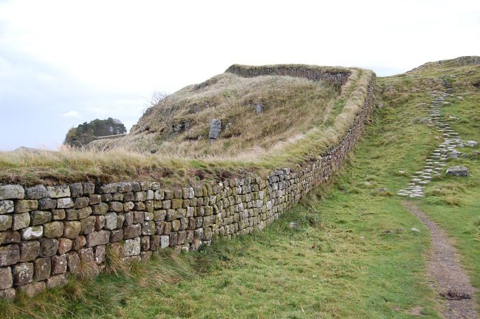 hadrian's wall stretching across the british countryside